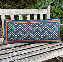 Chevron geometric needlepoint large lumbar cushion in dark red, old blues, copper and sand colors