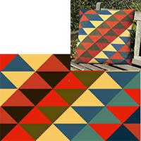 geometric lumbar companion in red, blue, olive, straw