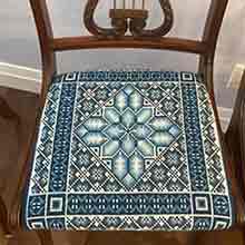 Meadow needlepoint custom upholstery on Chair Seat